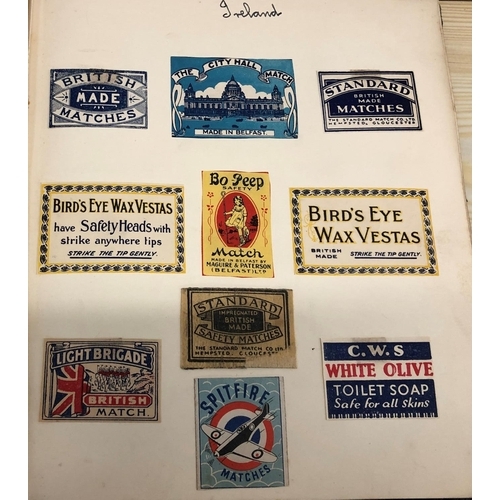 8064 - An album of match box covers and a quantity of loose matchbox covers.