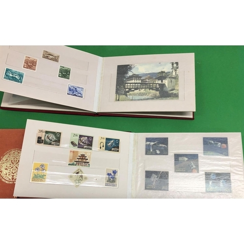 8077 - 2 Government of Bhutan Post & Telegraphs Department albums. (2)