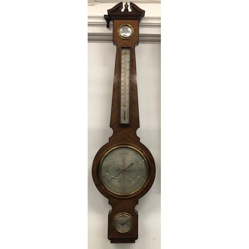 8087 - A reproduction mahogany bajo barometer (working) height 88cm.