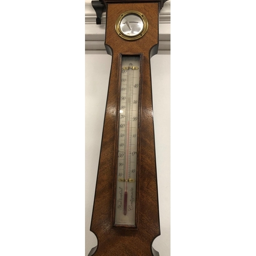 8087 - A reproduction mahogany bajo barometer (working) height 88cm.