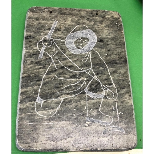 8101 - A quantity of soapstone Eskimo art figures, a plaque depicting an Eskimo fishing and various other f... 