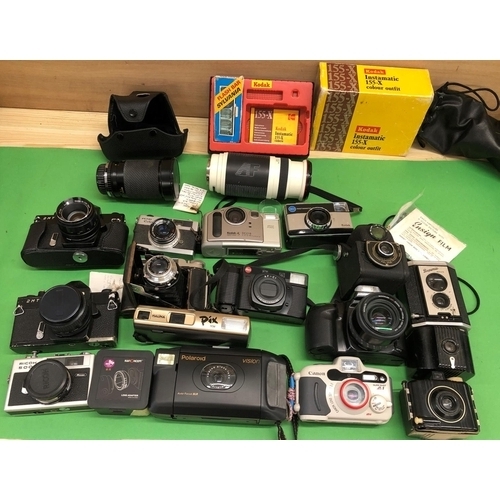 8129 - A quantity of cameras, Ricoh 500, Polaroid Vision, Edixa 2MTL, Minolta Dynax 300si, Balda, Petri Col... 