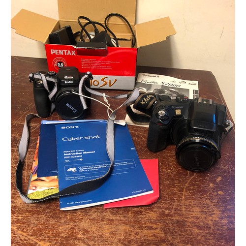 8086 - Sony Cybershot DSC-W55 7823107 digital camera with charging cable and instructions (not in original ... 