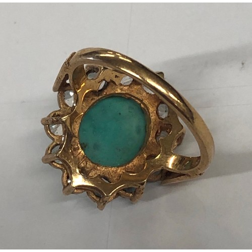 401 - A 9ct gold cluster ring set with turquoise coloured stone, Size M/N