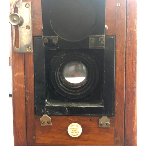 855 - Thornton Pickard mahogany box camera, a quantity of mahogany leather and other photographic plates e... 