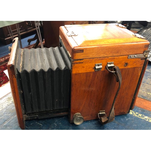 855 - Thornton Pickard mahogany box camera, a quantity of mahogany leather and other photographic plates e... 