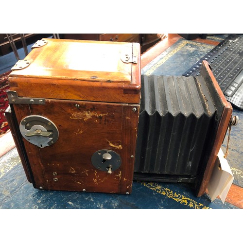 855 - Thornton Pickard mahogany box camera, a quantity of mahogany leather and other photographic plates e... 