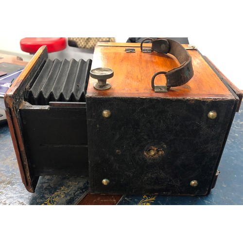 855 - Thornton Pickard mahogany box camera, a quantity of mahogany leather and other photographic plates e... 