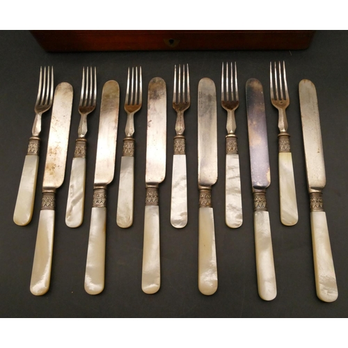 302 - A set of 12 silver plated and Mother of Pearl handled dessert knives and forks, 12 knives and 12 for... 