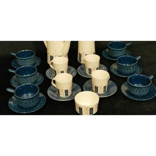 12 - A Beswick part service comprising of teapot, hot water jug, sugar bowl, 4 cups, 4 saucers, also a Ta... 