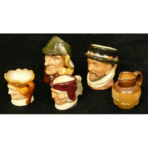 28 - 4 miniature Royal Doulton jugs 