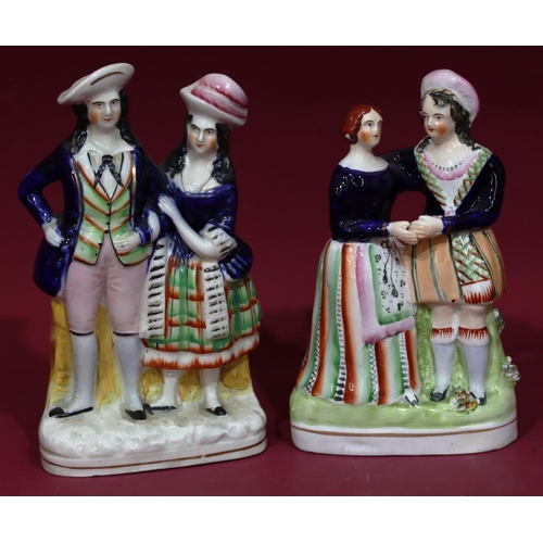 101 - 2 19th Century Staffordshire theatrical figures of a man and a woman, largest 23cm high (2)