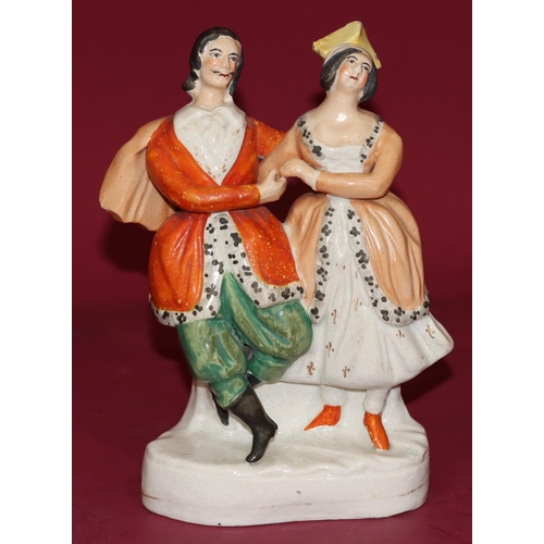 103 - A 19th Century Staffordshire figure of a lady and gentleman, circa 1840, 20cm high