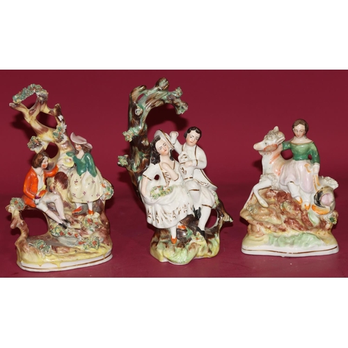 107 - 3 19th Century Staffordshire groups depicting a rural scene, largest 19cm high (3)