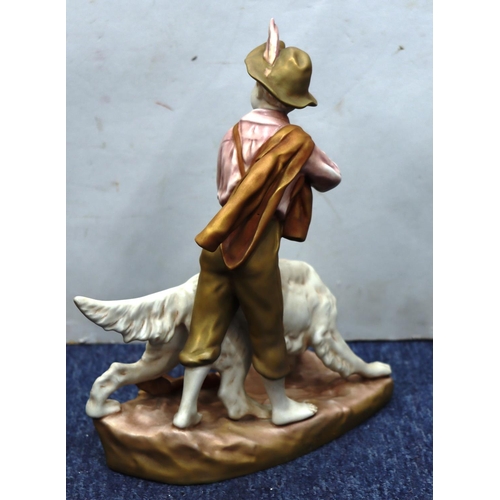 13 - A Royal Dux group of young boy and dog, 33cm high