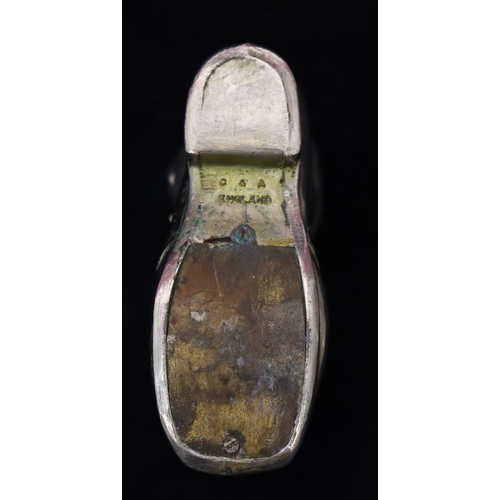183 - A modern chrome plated pin cushion in the form of a shoe, 12cm long
