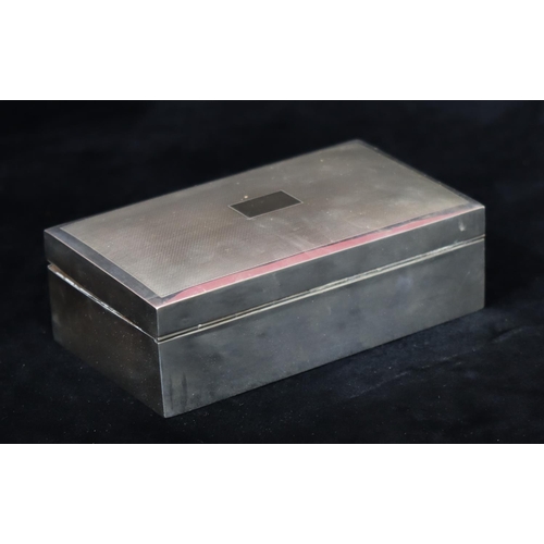 188 - A Birmingham silver Military rectangular shaped cigarette box with engine turned hinged lid, engrave... 