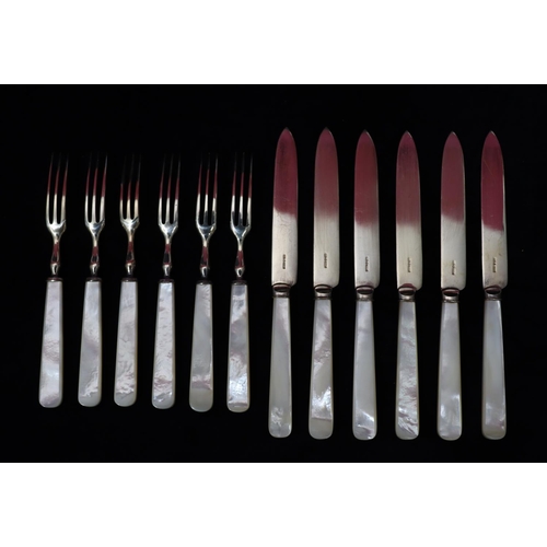 219 - A set of 6 Mother of Pearl handled fruit knives and forks, comprising of 6 knives and 6 forks, in fi... 