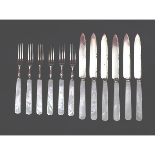 219 - A set of 6 Mother of Pearl handled fruit knives and forks, comprising of 6 knives and 6 forks, in fi... 