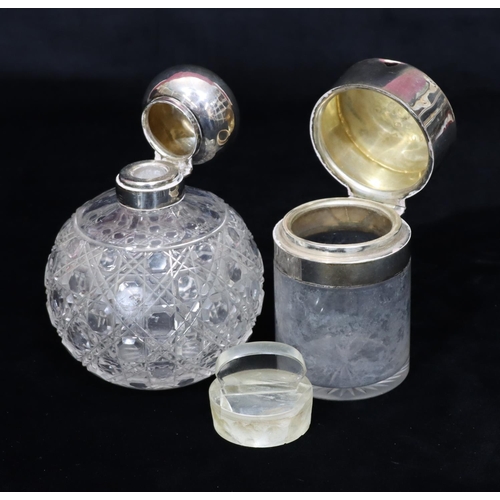 230 - A cut glass round bulbous shaped scent bottle with Birmingham silver neck and hinged lid (no inner s... 