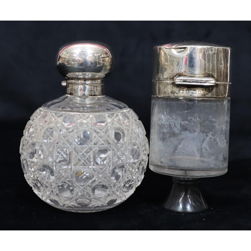 230 - A cut glass round bulbous shaped scent bottle with Birmingham silver neck and hinged lid (no inner s... 