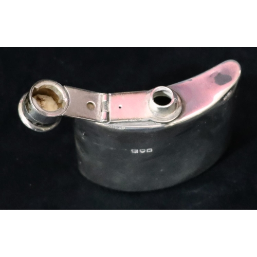 235 - A London small silver concaved shaped hip flask with screw hinged lid (dented but not split), 8cm hi... 