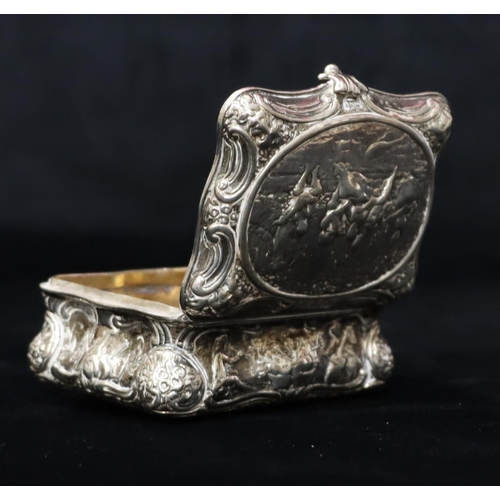 236 - A Continental imported silver rectangular scallop shaped snuff box with hinged lid and allover embos... 