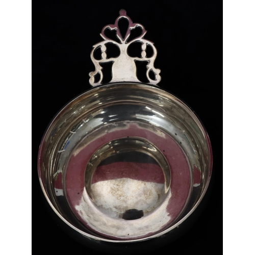 240 - A Victorian London silver round bulbous shaped porringer with pierced handle, maker's mark RH & Sons... 