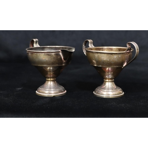 252 - El Il Co. Sterling Silver round 2-handled sugar bowl and matching cream jug on round weighted bases ... 