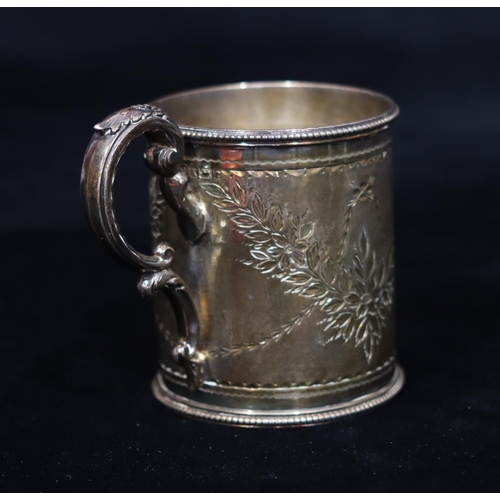 268 - A Victorian silver christening mug with ball rim and engraved floral and swag decoration, scroll han... 