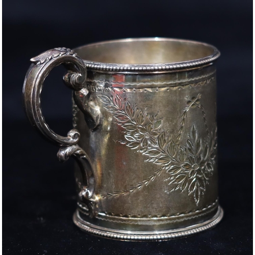 268 - A Victorian silver christening mug with ball rim and engraved floral and swag decoration, scroll han... 