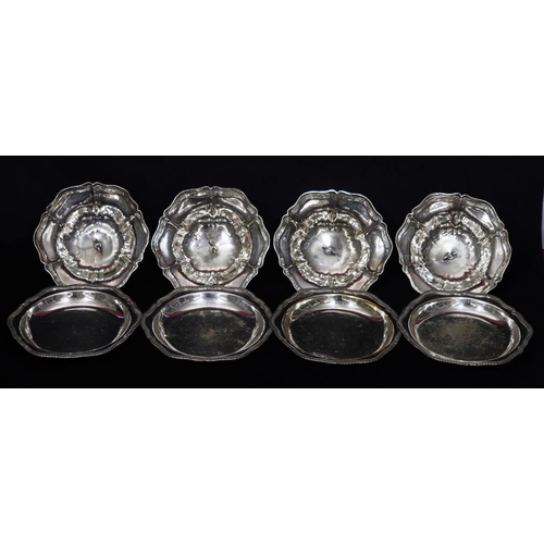 285 - A set of 4 Georgian silver round scallop shaped tureen covers with fish, scroll and shell handles on... 