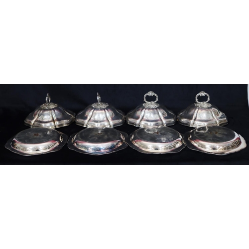 285 - A set of 4 Georgian silver round scallop shaped tureen covers with fish, scroll and shell handles on... 