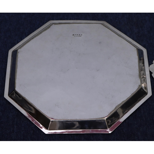 289 - An Elkington & Co silver plated octagonal shaped salver with inscription to centre, allover raised b... 