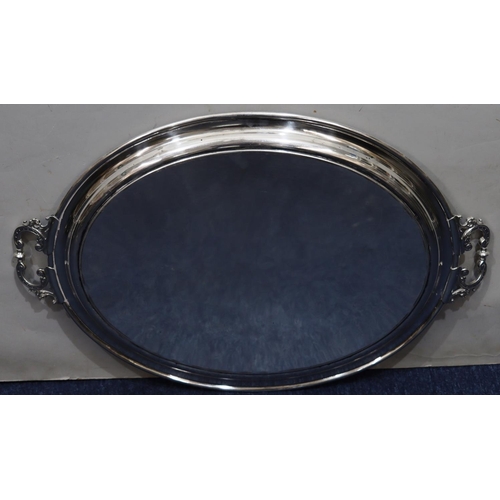 290 - A silver plated oval 2-handled tray with ball rim and engraved centre, 67cm wide