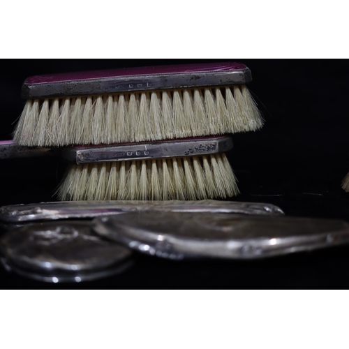 291 - A Birmingham silver and tortoiseshell gentlemen's hairbrush, 2 silver and pink enamelled brushes (en... 