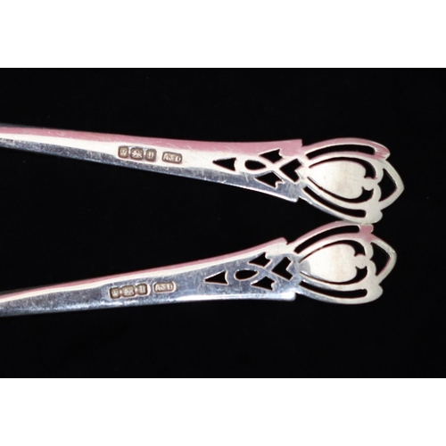 296 - A pair of Sheffield silver serving spoons with pierced handles, maker's mark A & D, 2.9oz (2)