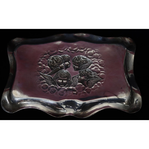 298 - An Edward VII silver rectangular scallop shaped dressing table tray with embossed cupid figurehead d... 