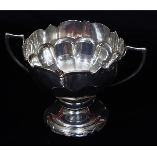 301 - A George V silver round bulbous 2-handled trophy with engraved presentation, scallop shaped rim on s... 