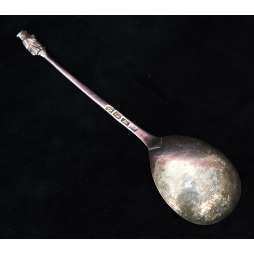 302 - A George III Apostle sealed topped spoon with hammered bowl, London 1774, maker's mark GS? in script... 