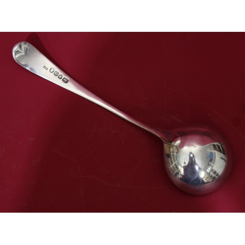 309 - A George III silver sauce ladle with engraved crest, maker's mark SA, 1.6oz