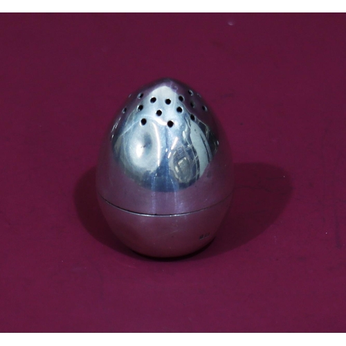 310 - A Victorian novelty silver weighted pepper pot in the form of an egg, 5.2cm high, 2.4oz (slight dent... 