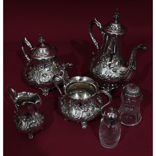 313 - A silver plated round bulbous 4-oiece tea and coffee service with allover embossed floral, leaf and ... 