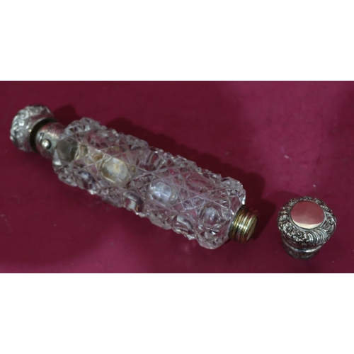 316 - A 19th Century cut glass cylindrical double-ended scent bottle, screw and hinged lids with embossed ... 