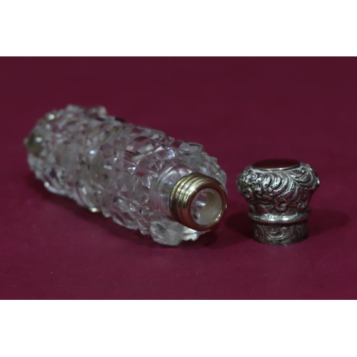 316 - A 19th Century cut glass cylindrical double-ended scent bottle, screw and hinged lids with embossed ... 