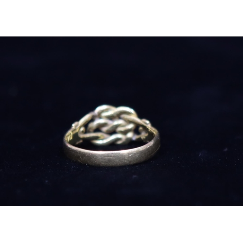 333 - An 18ct gold twist knot shaped ring, Size P/Q, 3.7 grams