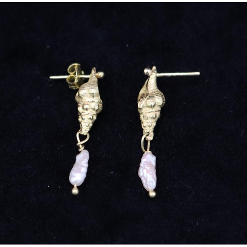 334 - A pair of 18ct gold and pearl drop earrings in the form of shells, overall weight 4.6 grams gross