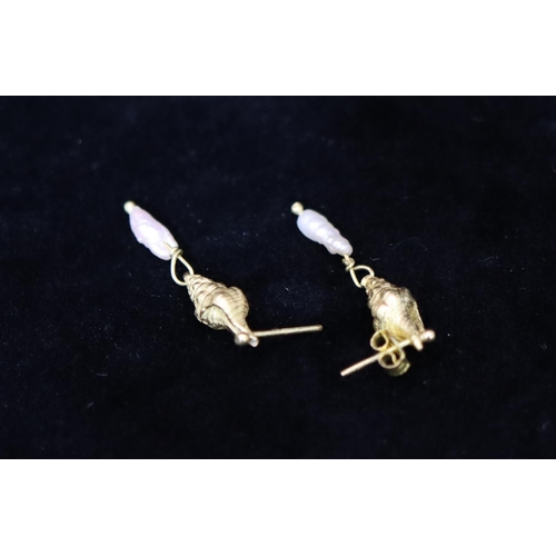 334 - A pair of 18ct gold and pearl drop earrings in the form of shells, overall weight 4.6 grams gross