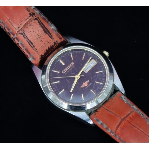 336 - A Citizen Automatic wristwatch with black dial, seconds hand and calendar, leather strap (strap worn... 