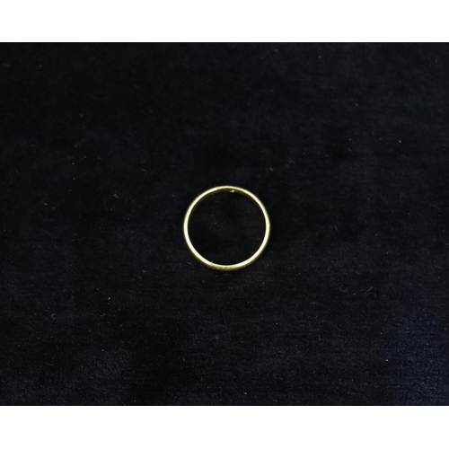 337 - A 22ct gold wedding ring, stamped 